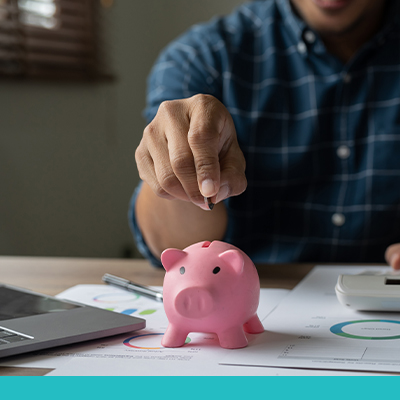 Man using piggy bank